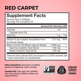 HUM Red Carpet Vitamin E & Black Currant Seed Oil Supplement on a wooden table