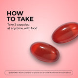 HUM Red Carpet Vitamin E softgels in a hand