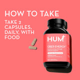 HUM Uber Energy supplement bottle with a green plant background