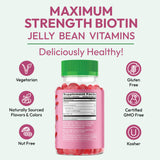 Human Beanz Biotin Jelly Bean Gummies displayed with fresh strawberries