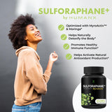 HUMANX Sulforaphane+ capsules on a wooden table