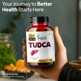 Humming Herbs TUDCA Bile Acid Supplement 1000mg with a glass of water