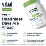 Hyperbiotics Prebiotic and Probiotic Capsules with a glass of water