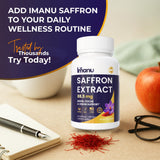 Imanu Saffron Extract Capsules with a measuring spoon