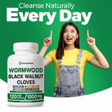 Immortal Herbs Wormwood Black Walnut Clove Cleanse vegan capsules in a bowl