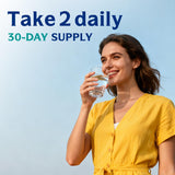 Innate Vitality Calcium Supplement capsules in a glass