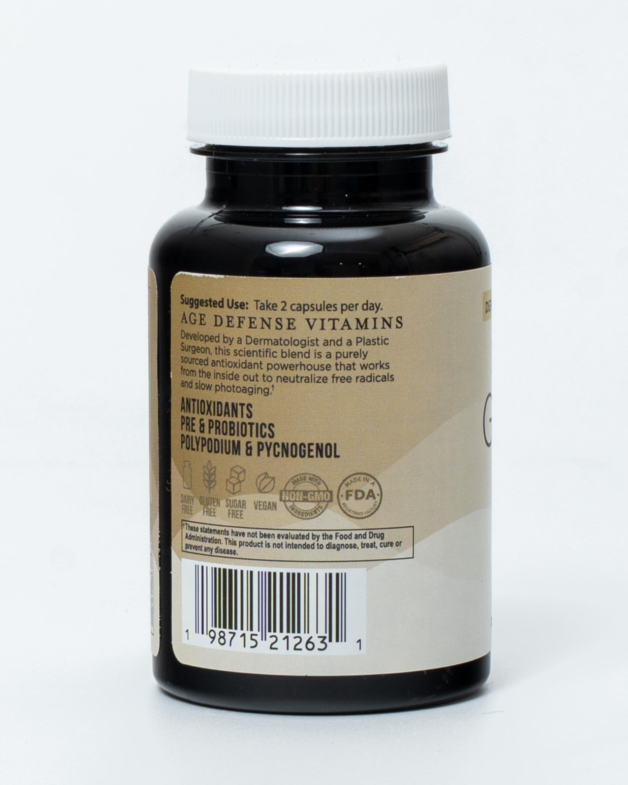 Inner Glow Age Defense Supplement 50g with a glass of water