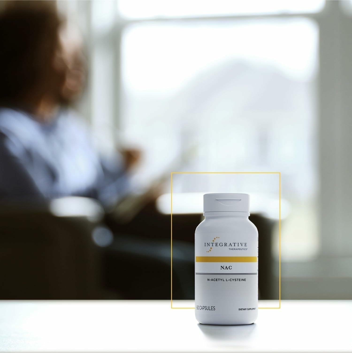 Integrative Therapeutics N-Acetyl L-Cysteine 600mg capsules on a wooden table