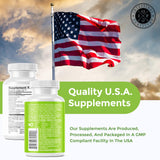 Intestinal Fortitude AI-5 Turmeric Supplement on a wooden table