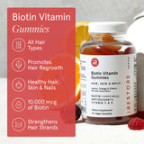 iRestore Biotin Gummies on a wooden table with lifestyle setting
