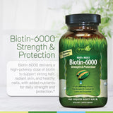 Irwin Naturals Biotin-6000 supplement on a wooden table