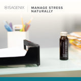 Isagenix Adaptogen Elixir bottle with a glass