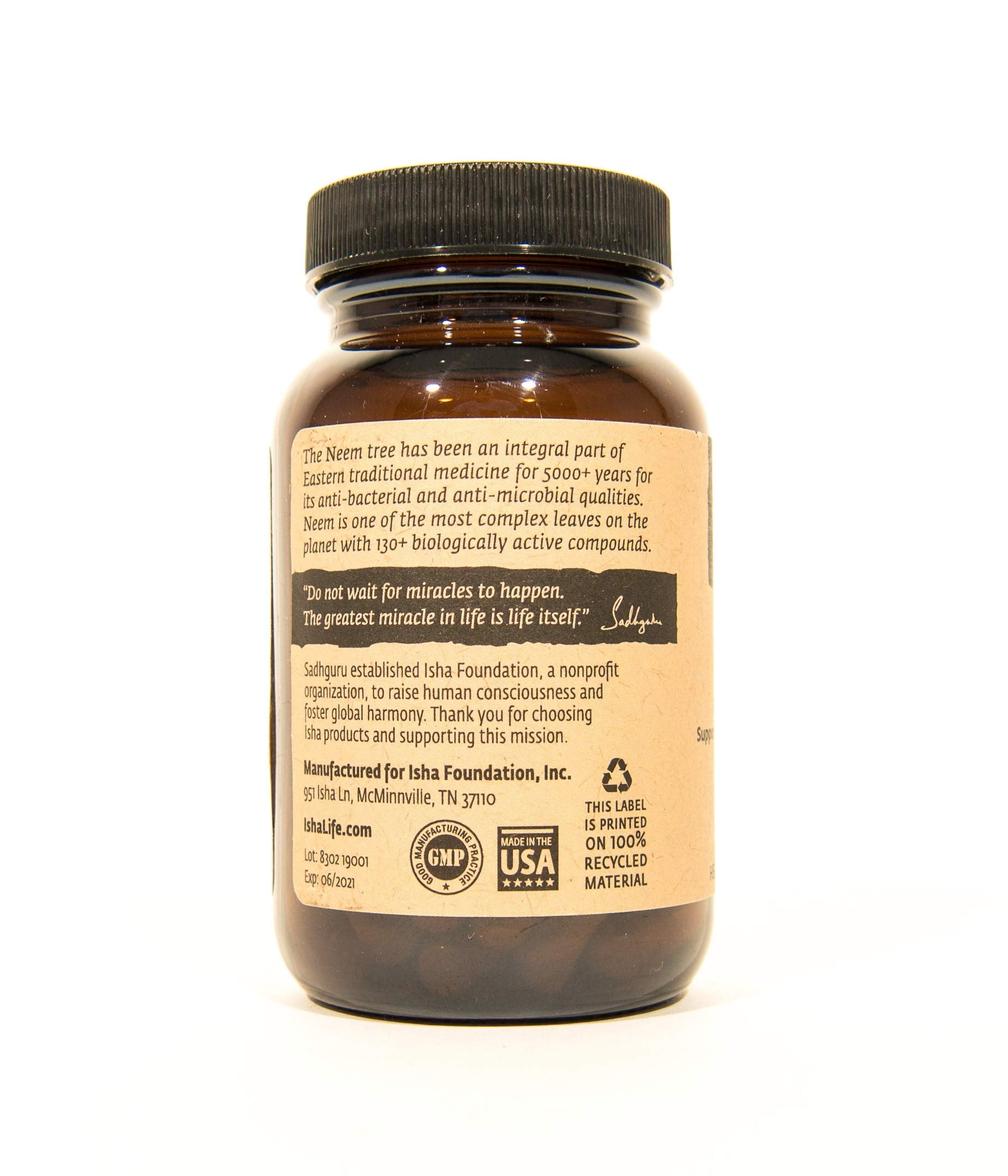 ISHA Neem Herbal Supplement 500mg Capsules on a wooden table