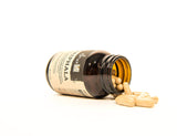 ISHA Triphala Capsules showing capsule size and colour