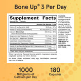 Jarrow Formulas BoneUp Three Per Day capsules in a hand