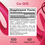 Jarrow Formulas Co-Q10 100mg capsules next to a glass of water