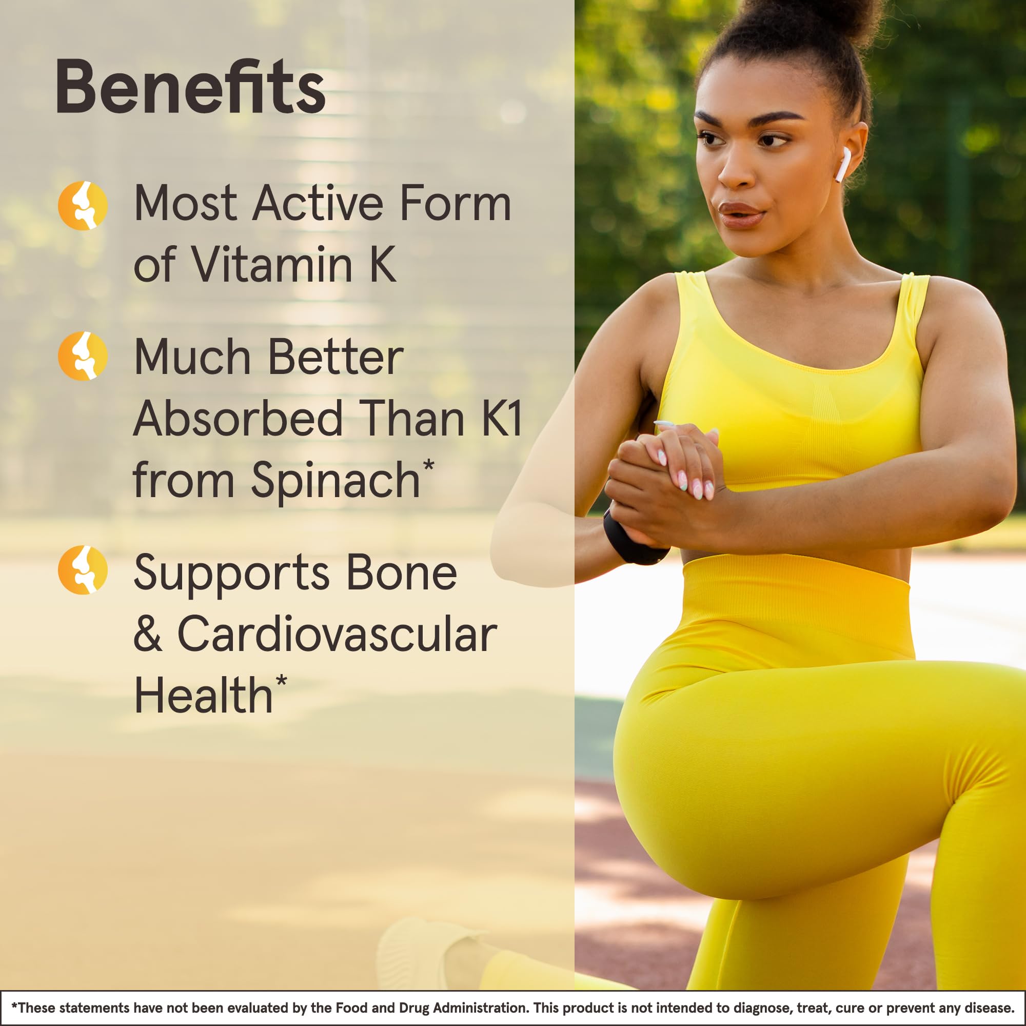 Jarrow Formulas MK-7 Vitamin K2 softgels on a wooden table
