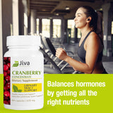 Jiva Botanicals Cranberry Capsules on wooden table