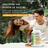 Jiva Botanicals Moringa Powder Capsules on a wooden table