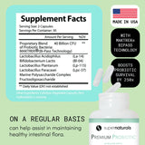 JLM NUTRITIONALS Probiotic Supplement bottle with a glass of water