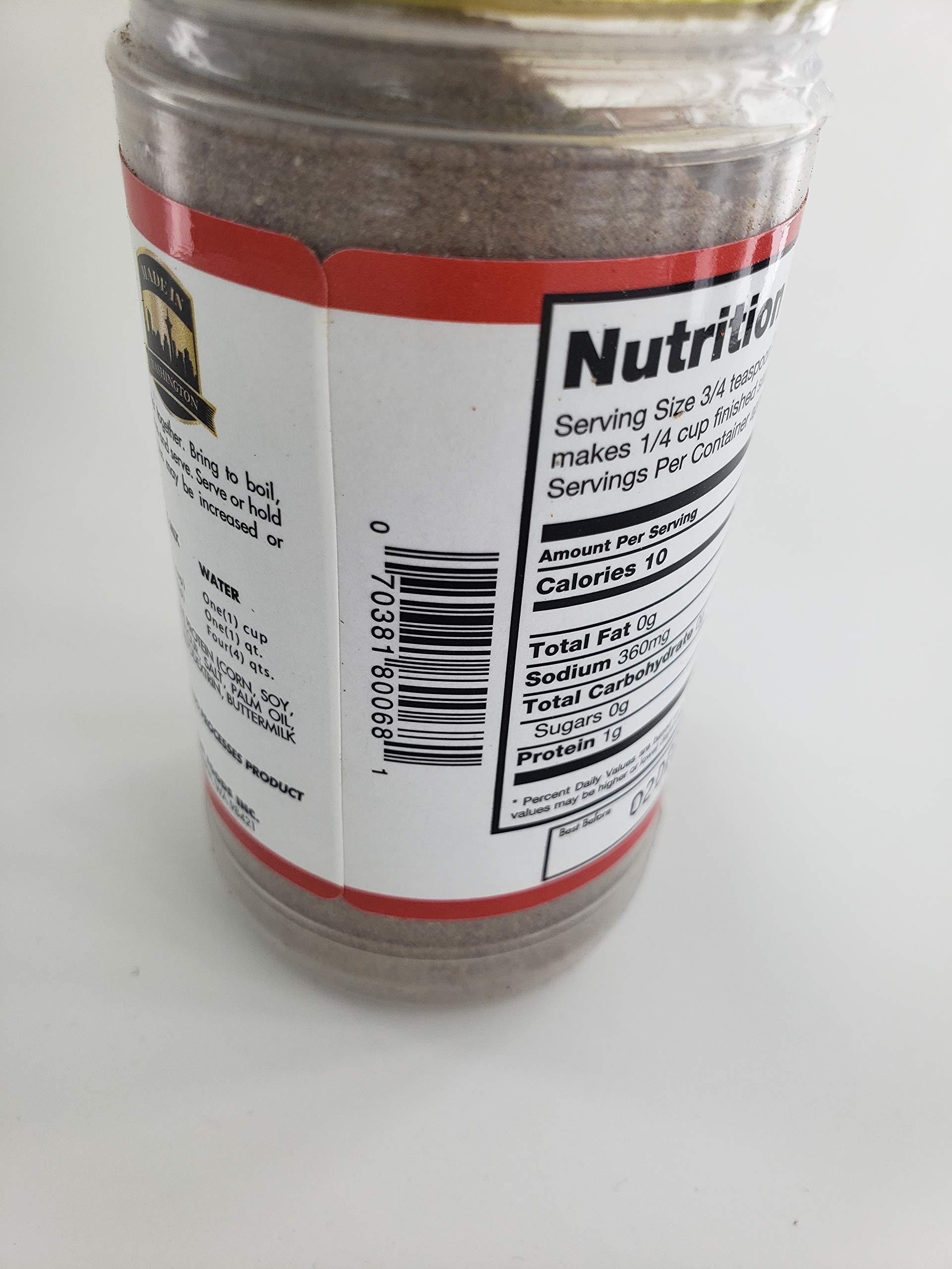 Johnny's Au Jus Powder 170g with a bowl of prepared sauce