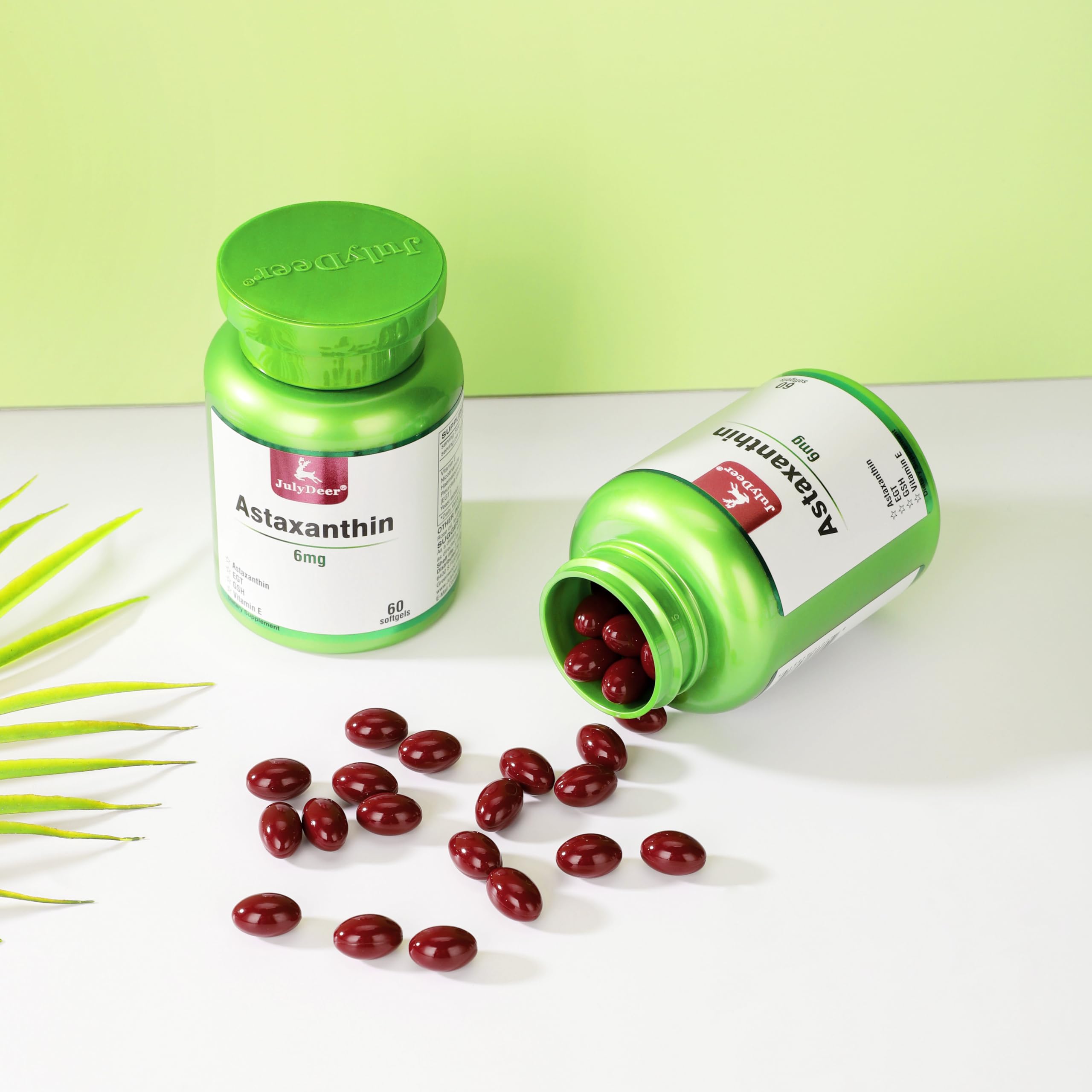 JulyDeer Astaxanthin Supplement capsule on a wooden surface