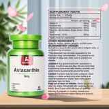 JulyDeer Astaxanthin Supplement capsules in a hand