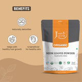 Just Jaivik Organic Neem Leaves Powder on a wooden surface