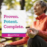 Just Thrive Blended Vitamin & Mineral Supplement on a kitchen counter
