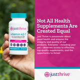 Just Thrive Blended Vitamin & Mineral Supplement with a glass of water