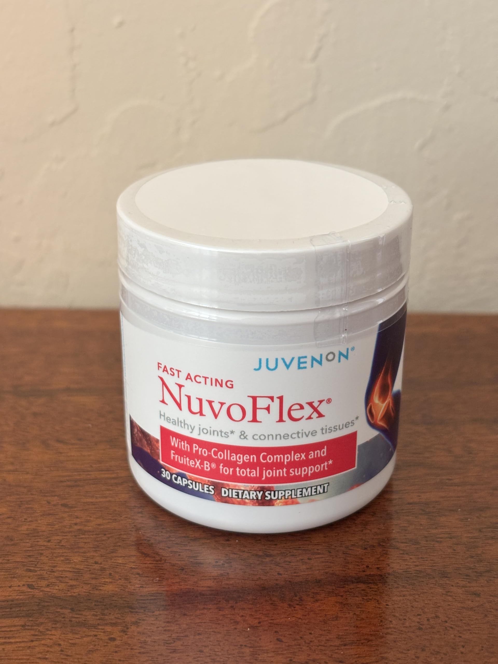 Juvenon NuvoFlex Pro Collagen Joint Comfort with measuring spoon