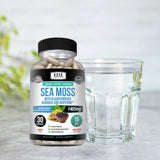 Kaya Naturals Sea Moss supplement on a wooden table