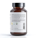 Kerala Ayurveda Triphala Capsules with a measuring spoon for dosage