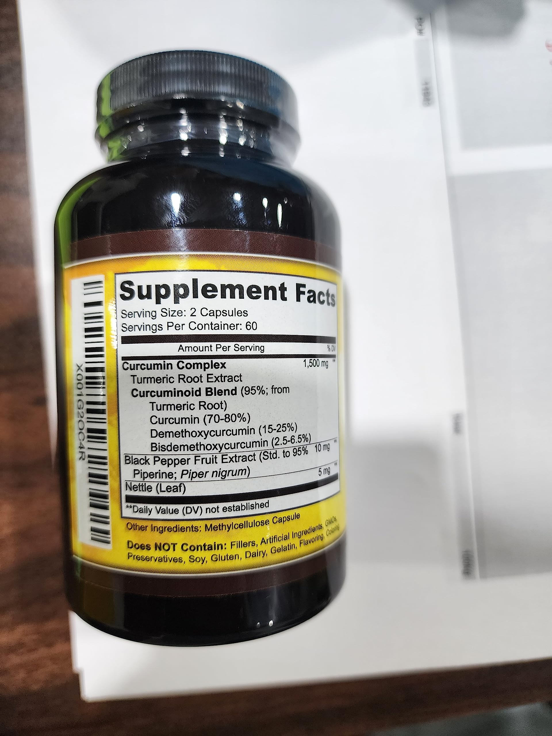 Key Nutrition Turmeric Curcumin Complex 750mg bottle in a kitchen setting