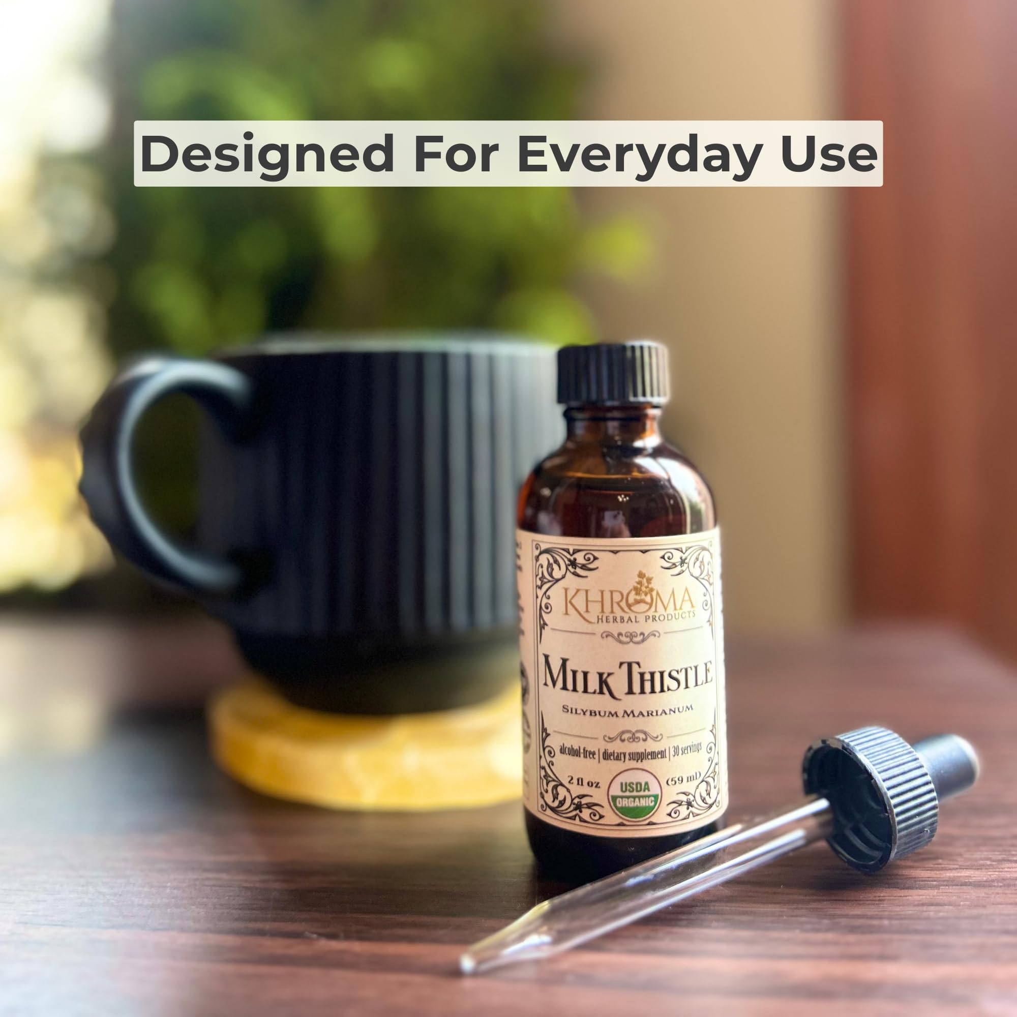 Khroma Herbal Products Organic Milk Thistle Tincture with a dropper