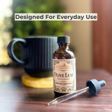 Khroma Olive Leaf Extract bottle on a wooden table