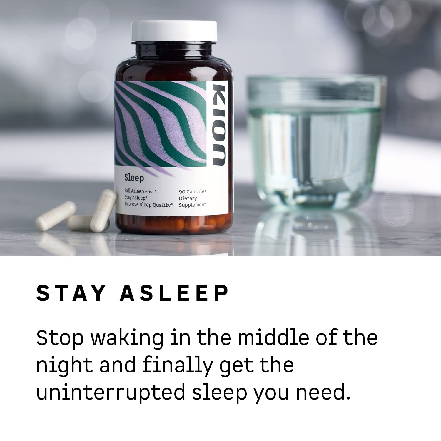 Kion Natural Sleep Aid Capsules on a wooden surface