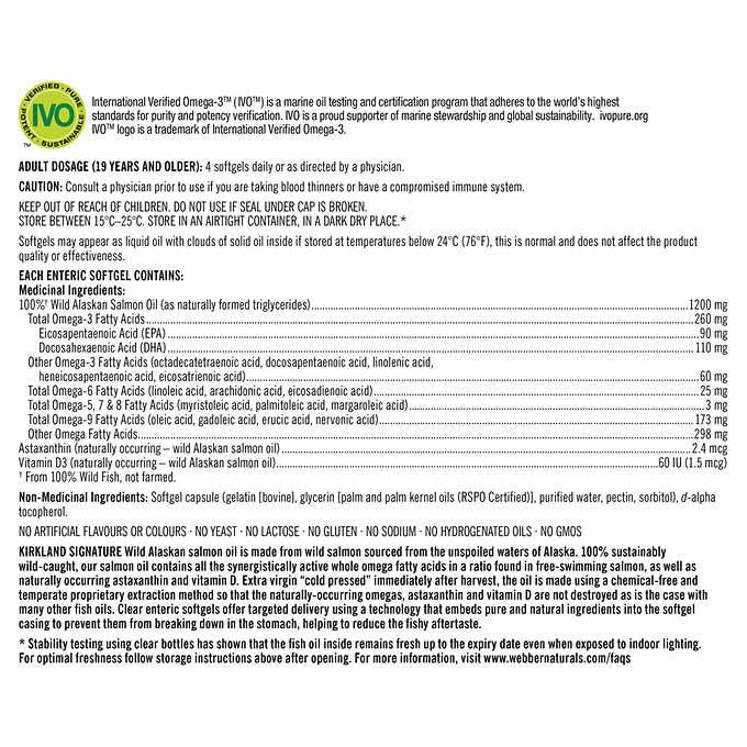 KIRKLAND Wild Alaskan Salmon Oil softgels in a hand