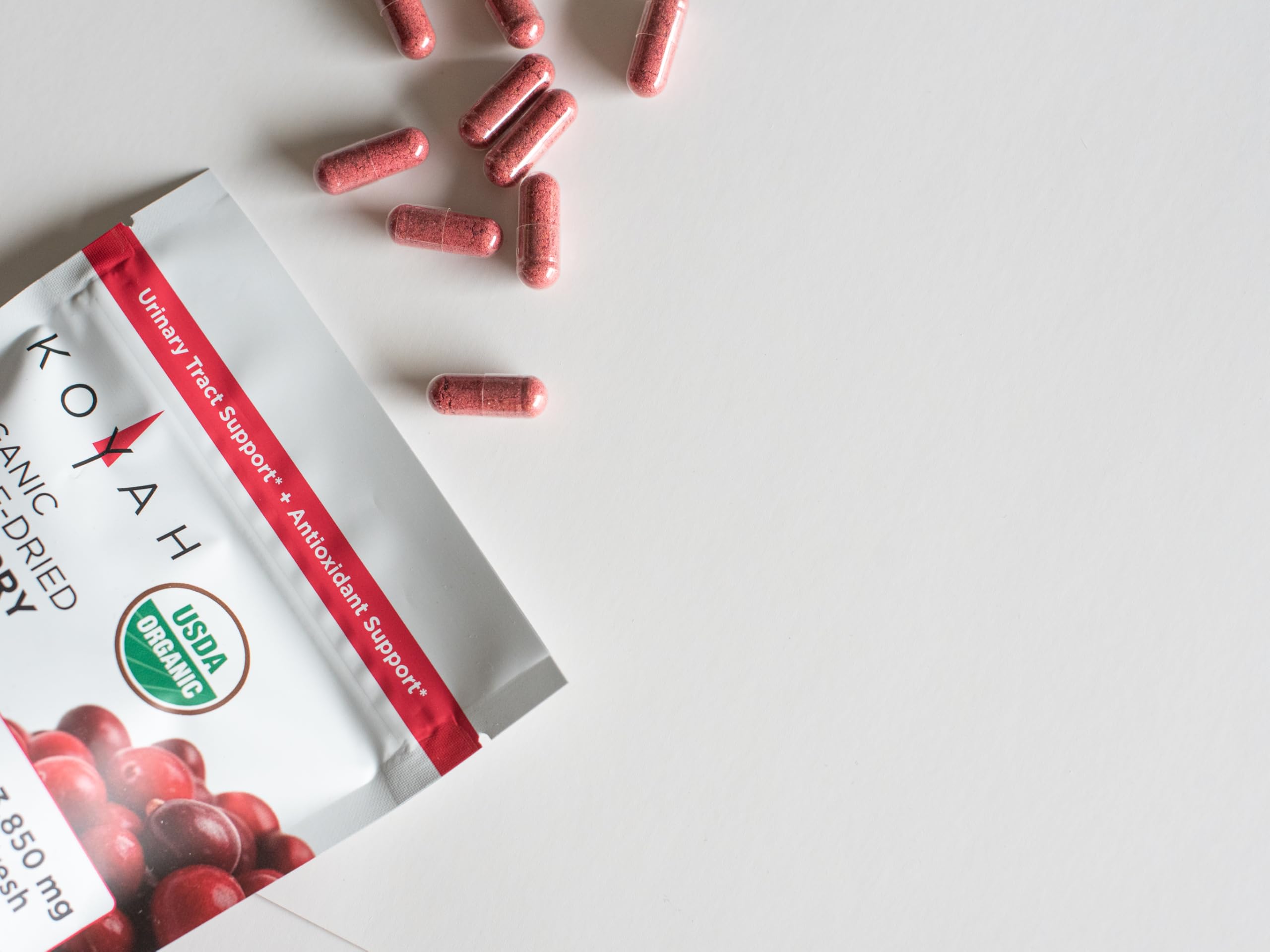 KOYAH Cranberry Powder Capsules in a lifestyle setting