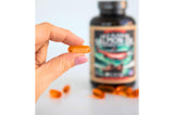 Kwee-Jack Wild Alaskan Salmon Oil Omega-3 Supplement bottle on a table