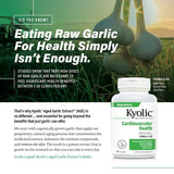 Kyolic Aged Garlic Extract capsules on a wooden table