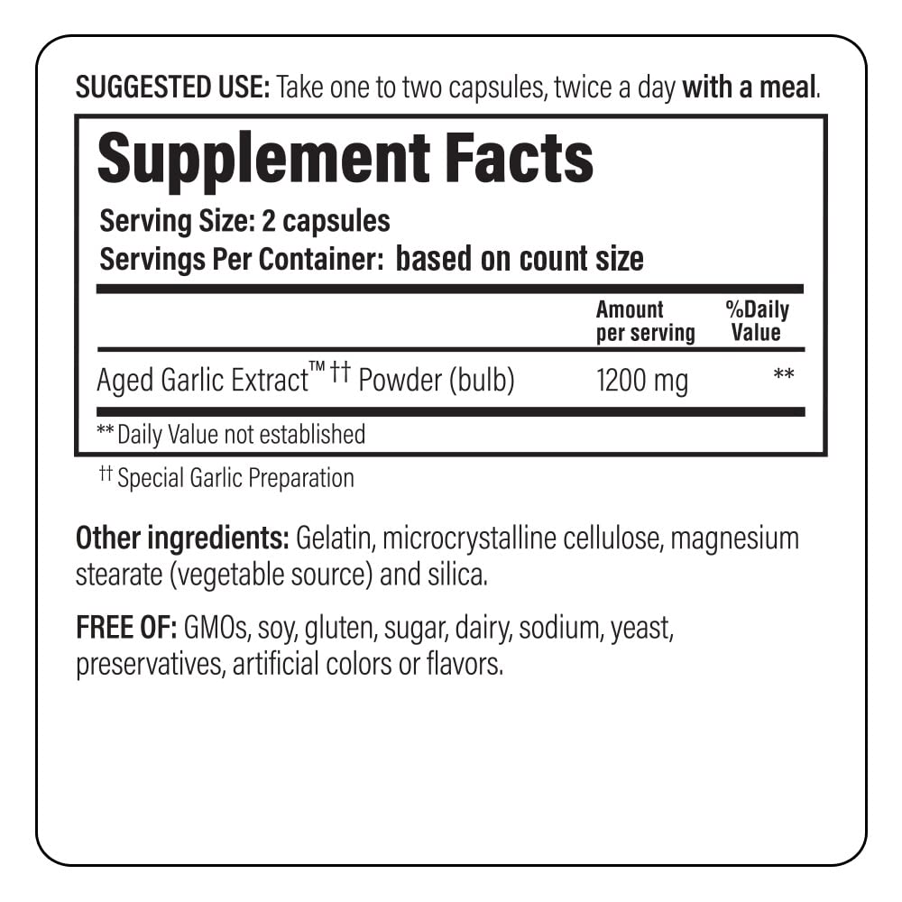 Kyolic Aged Garlic Extract Capsules with a measuring spoon