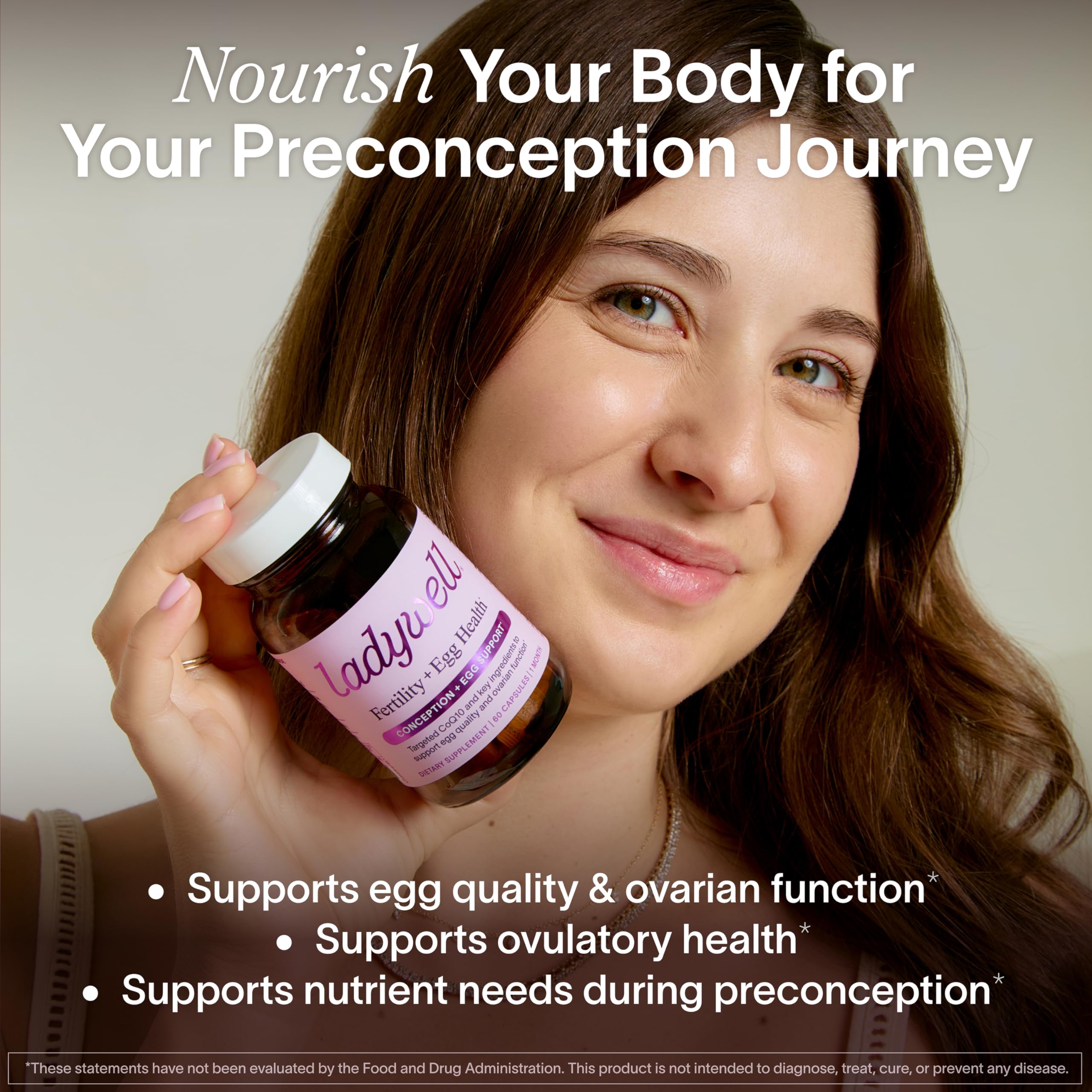 Ladywell Prenatal Vitamins capsules on a wooden surface