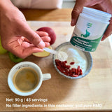 Layer Origin Prebiotic Powder 120g with a measuring spoon