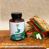 Layer Origin Prebiotic Powder 50g in a glass of water