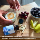 Layer Origin Synbiotic Capsules displayed with other health supplements