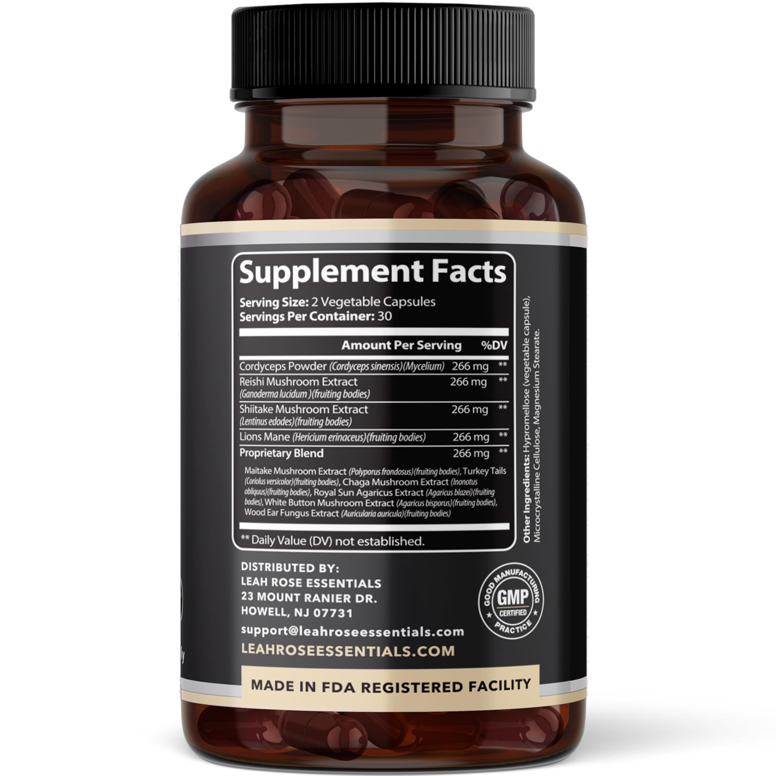 Leah Rose Essentials Mushroom Complex 10 Blend bottle with a plant background