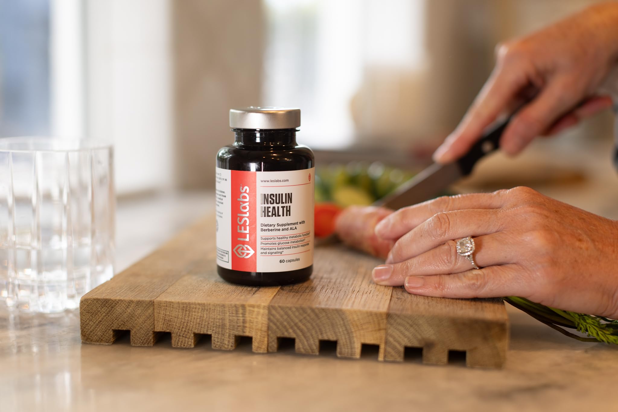 LES Labs Chromium Supplement bottle with a hand for size reference