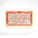 Li Chung Shing Tong Herbal Supplement on a wooden table