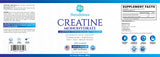 Liarminoo Creatine Monohydrate Powder in a glass of water